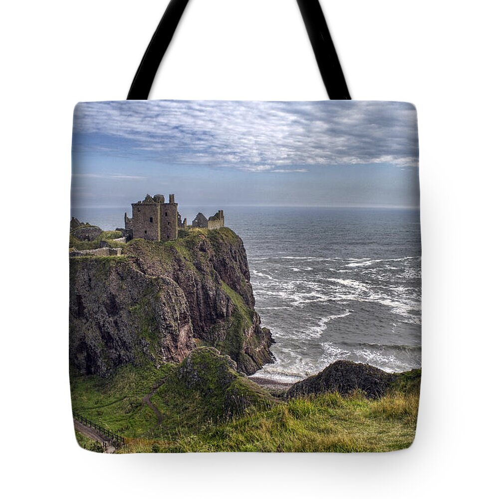 Scotland Tote Bag featuring the photograph Dunnottar Castle and the Scotland Coast by Jason Politte