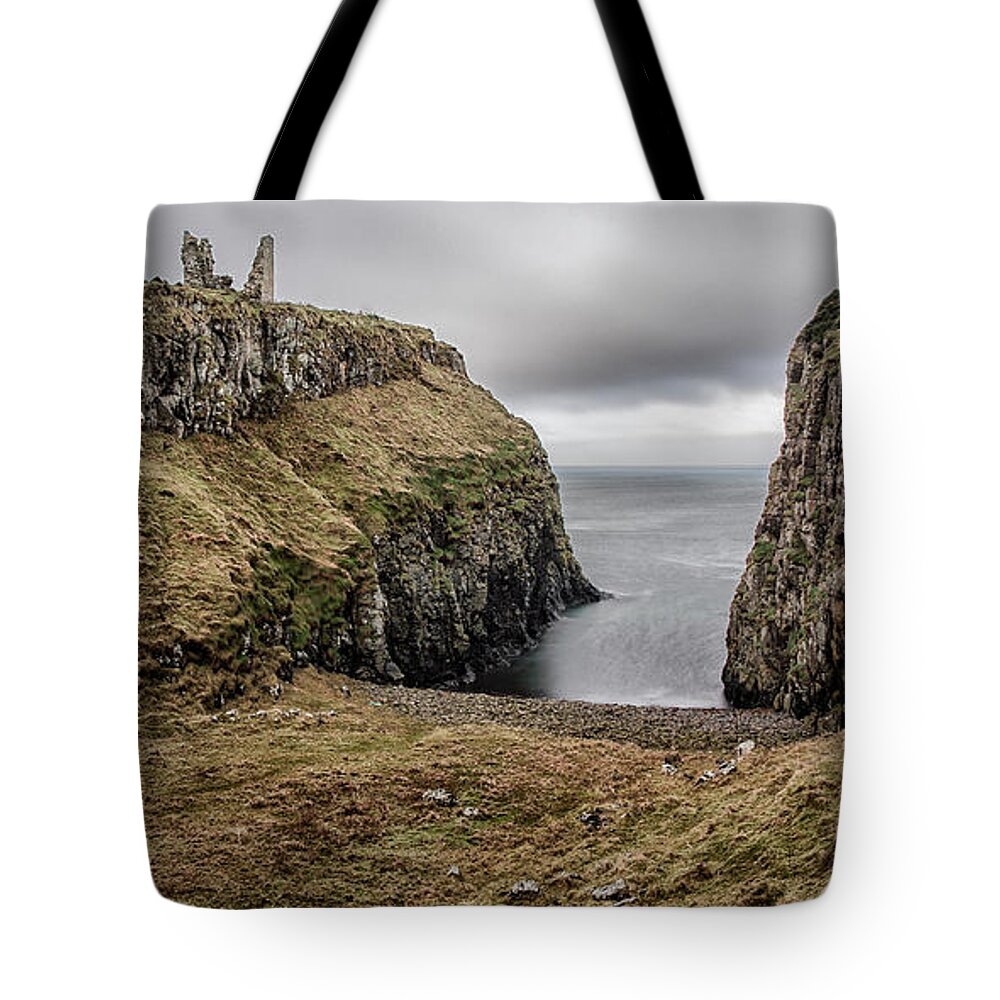Dunseverick Tote Bag featuring the photograph Dunseverick Castle by Nigel R Bell