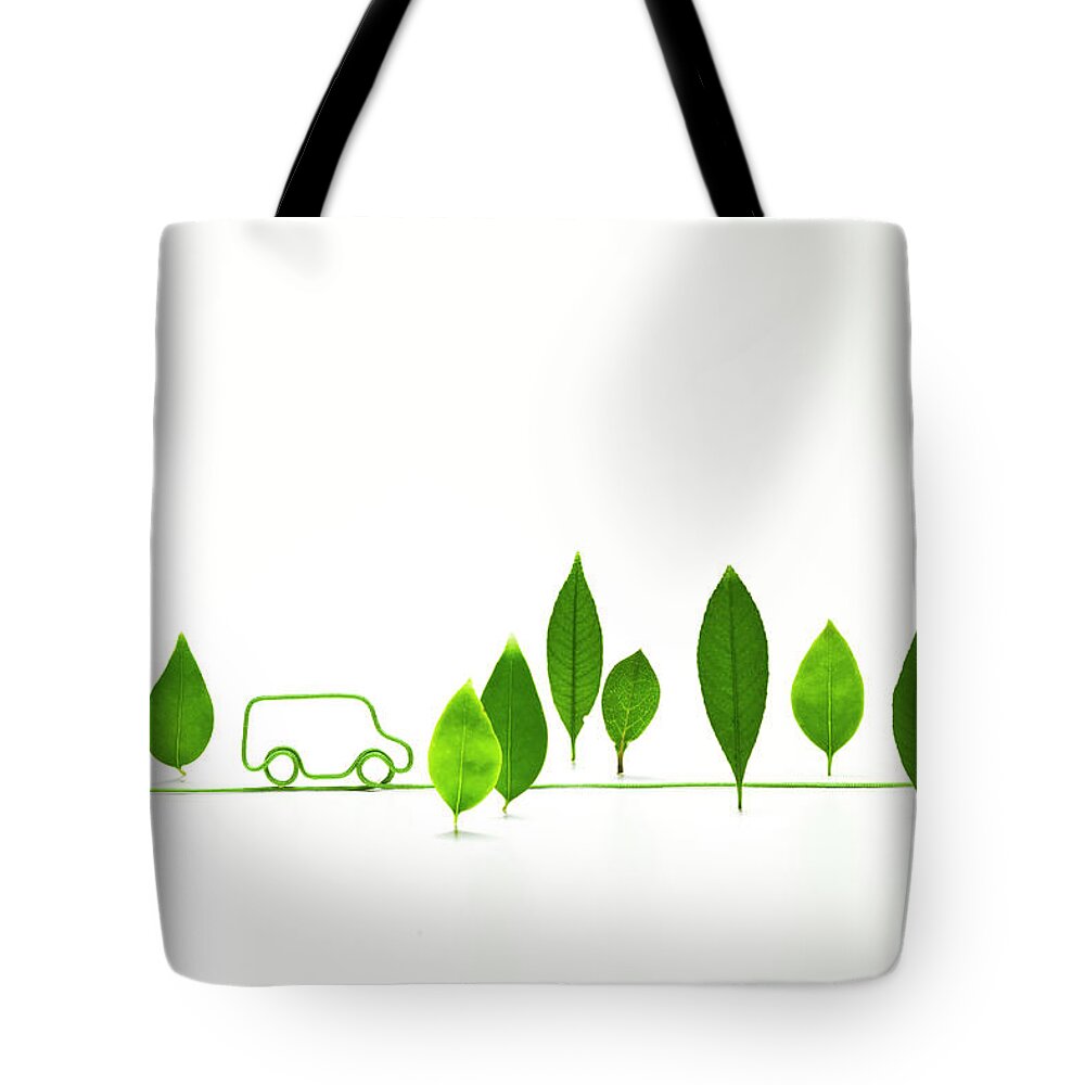 Environmental Conservation Tote Bag featuring the photograph Eco-car Shaped  Electric Cord With by Yuji Sakai