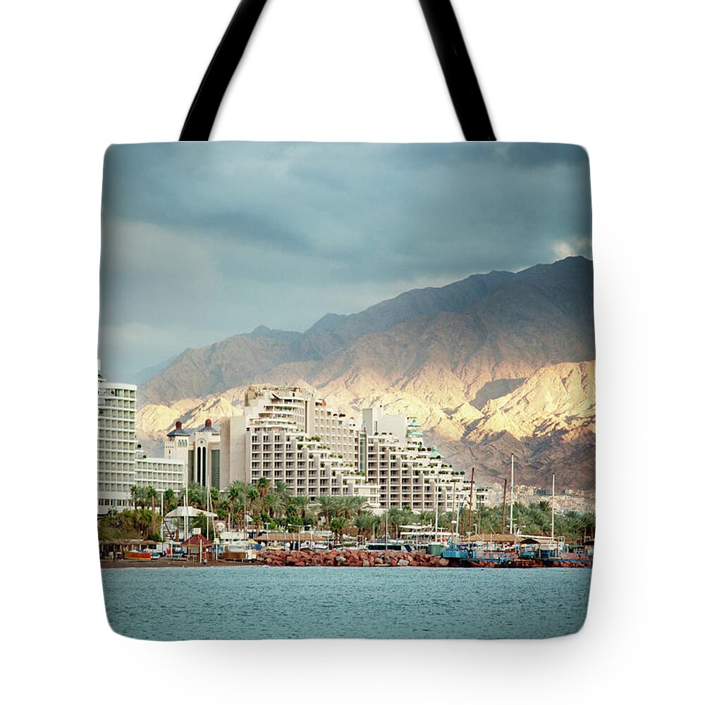 Apartment Tote Bag featuring the photograph Eilat At Sunset by Nadzeya kizilava