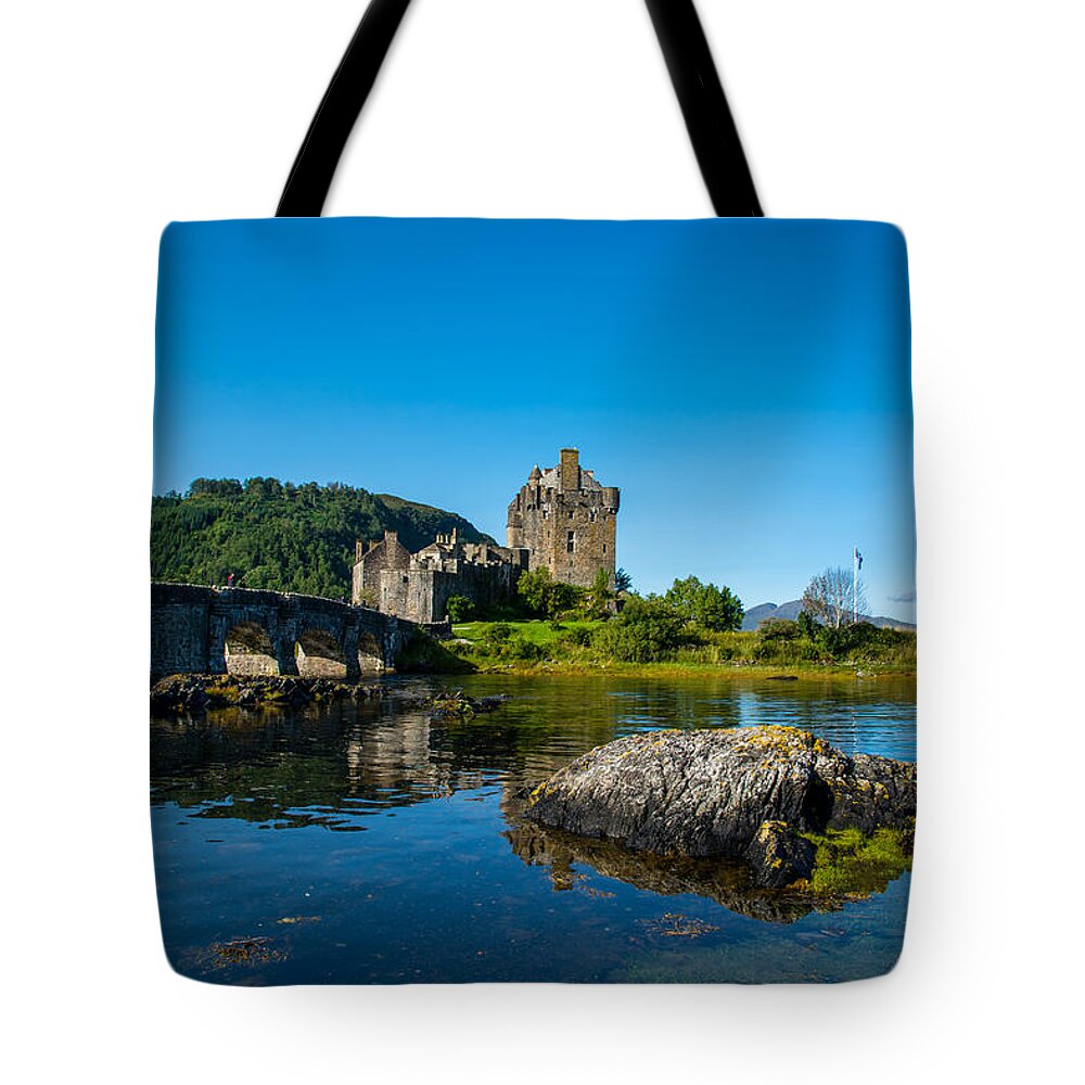Scotland Tote Bag featuring the photograph Eilean Donan Castle In Scotland by Andreas Berthold