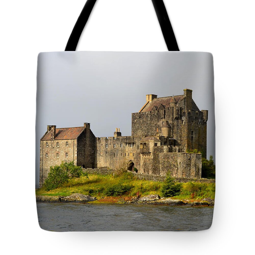 Eilean Donan Tote Bag featuring the photograph Eilean Donan Castle in Scotland by DejaVu Designs