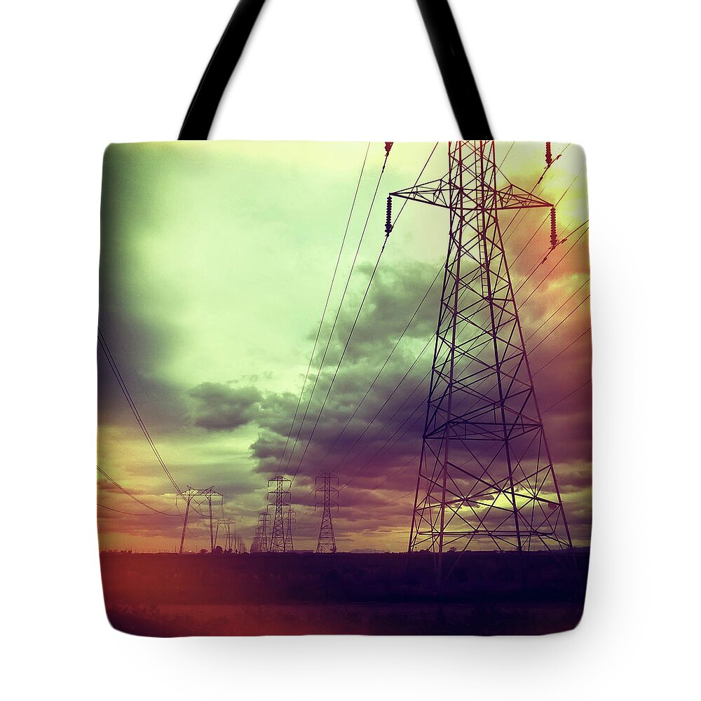 Tranquility Tote Bag featuring the photograph Electricity Pylons by Mardis Coers