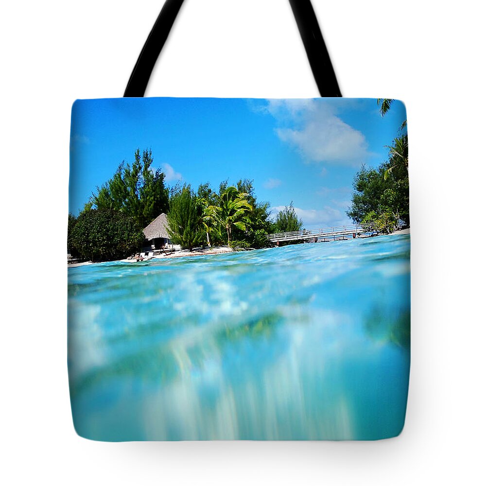French Polynesia Tote Bag featuring the photograph Emerging by Zinvolle Art