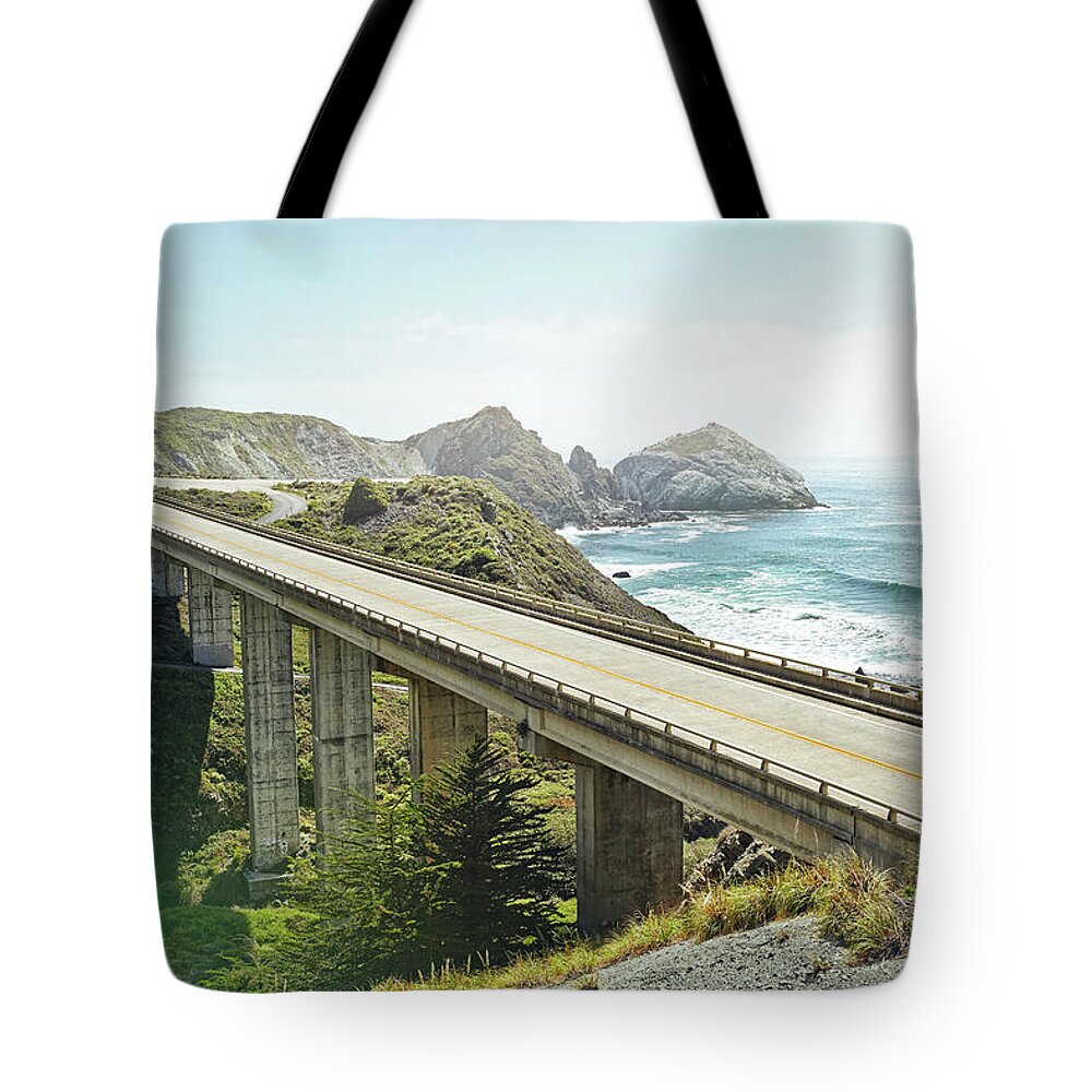 Scenics Tote Bag featuring the photograph Empty Bridge Overlooking The Sea by James O'neil