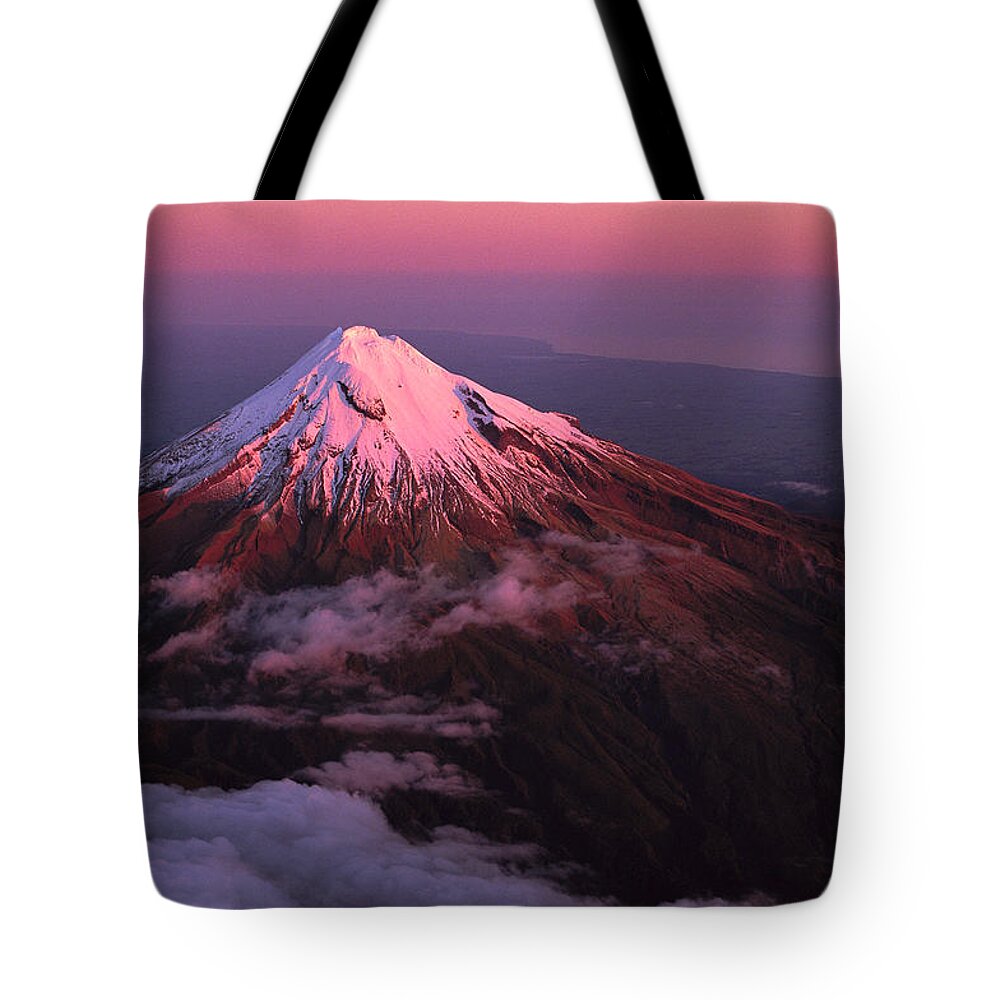 00260289 Tote Bag featuring the photograph Evening Light On Mt Taranaki by Rob Brown
