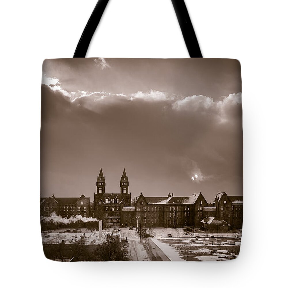Richardson Tote Bag featuring the photograph Eyes over Richardson Center by Chris Bordeleau