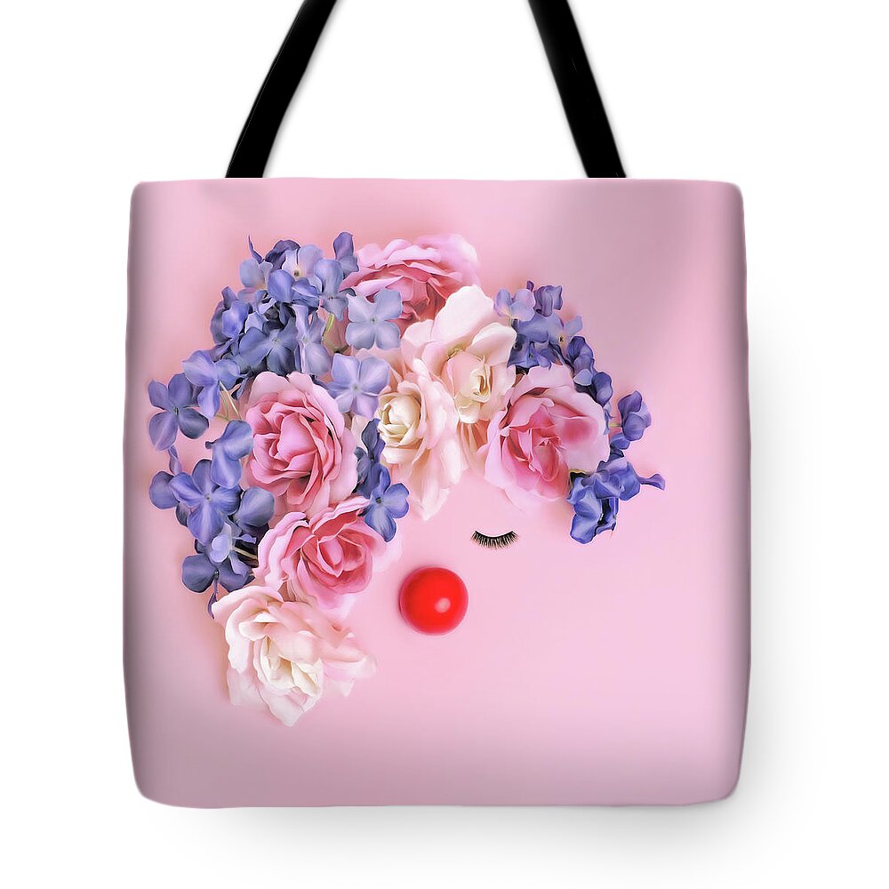 Clown's Nose Tote Bag featuring the photograph Face Made From Flowers And False by Juj Winn
