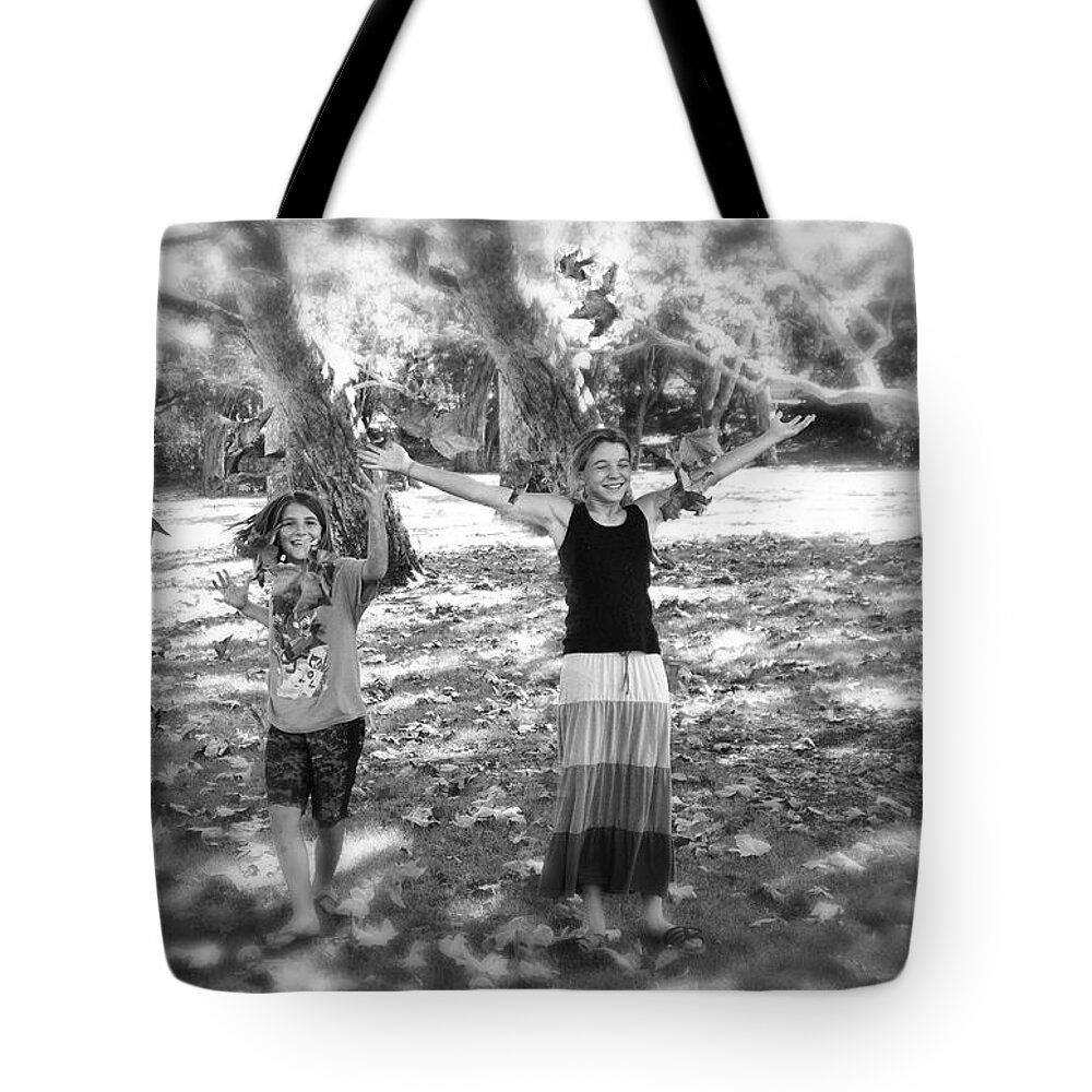 Falling Tote Bag featuring the photograph Falling Leaves by Diana Haronis