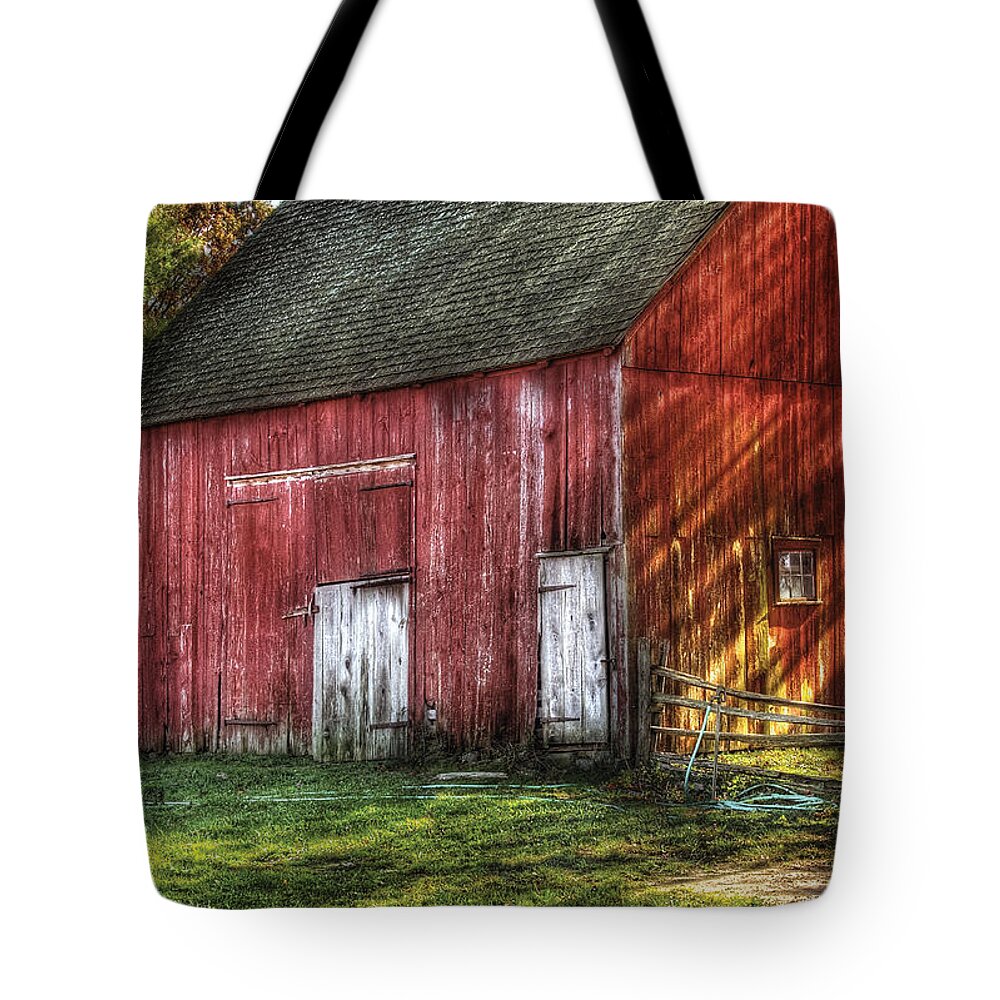 Savad Tote Bag featuring the photograph Farm - Barn - The old red barn by Mike Savad