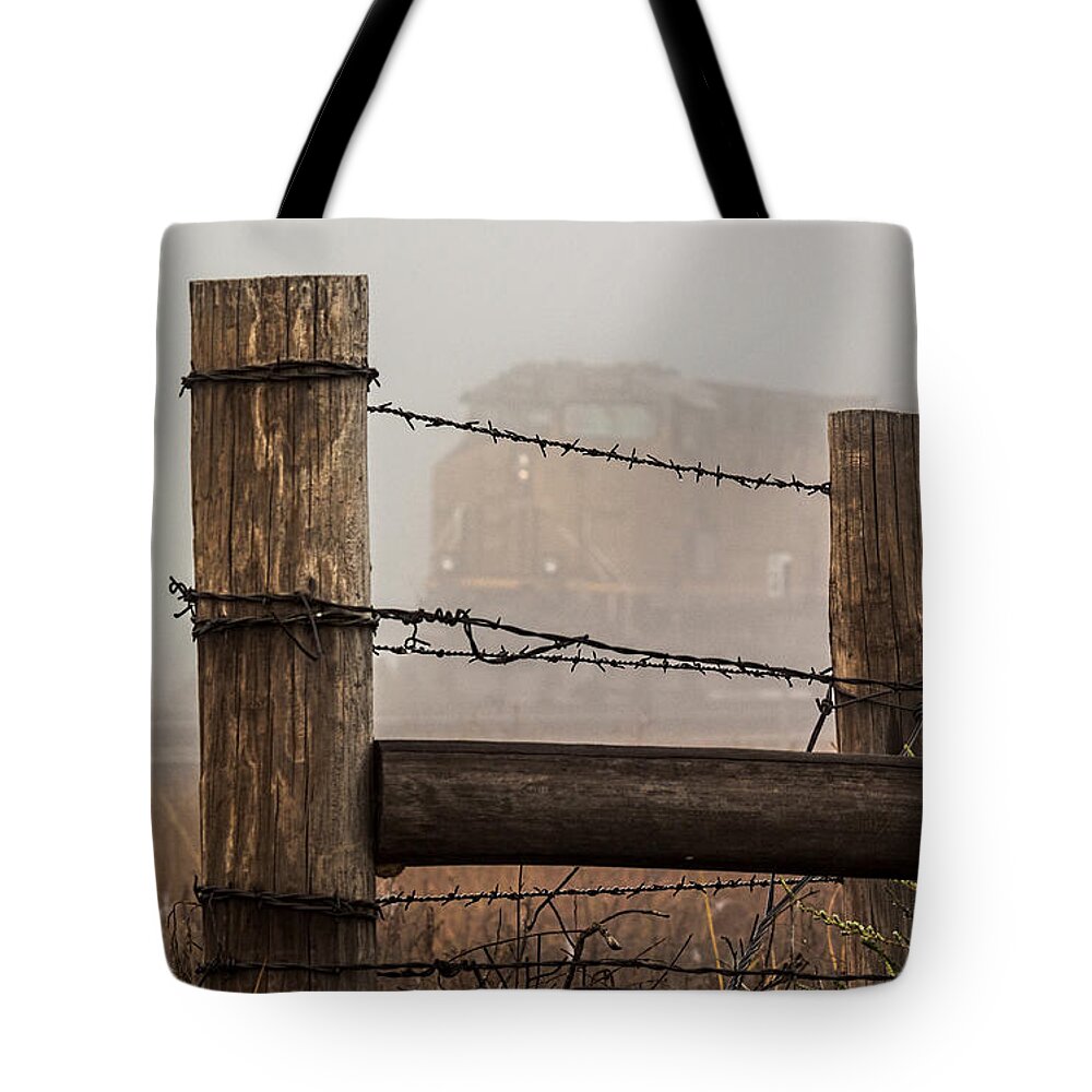 2014 September Tote Bag featuring the photograph Fenced In by Bill Kesler