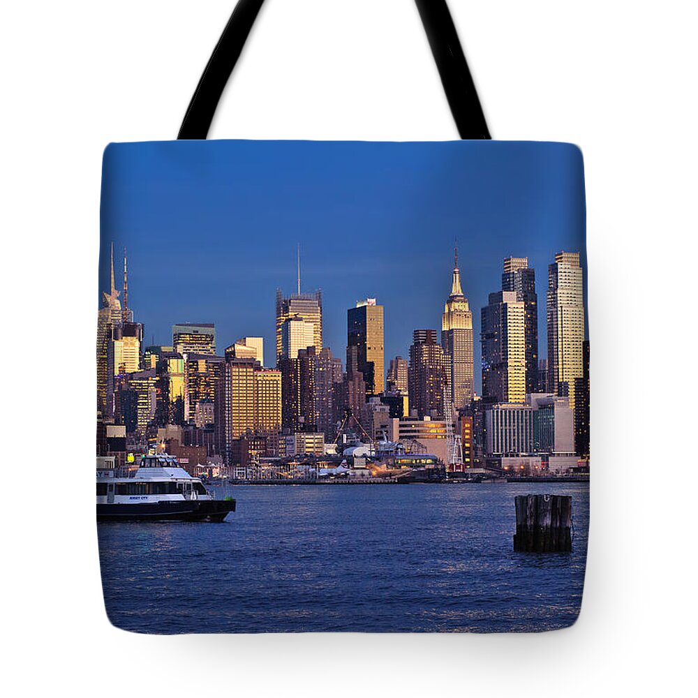Best New York Skyline Photos Tote Bag featuring the photograph Ferry past Manhattan by Mitchell R Grosky