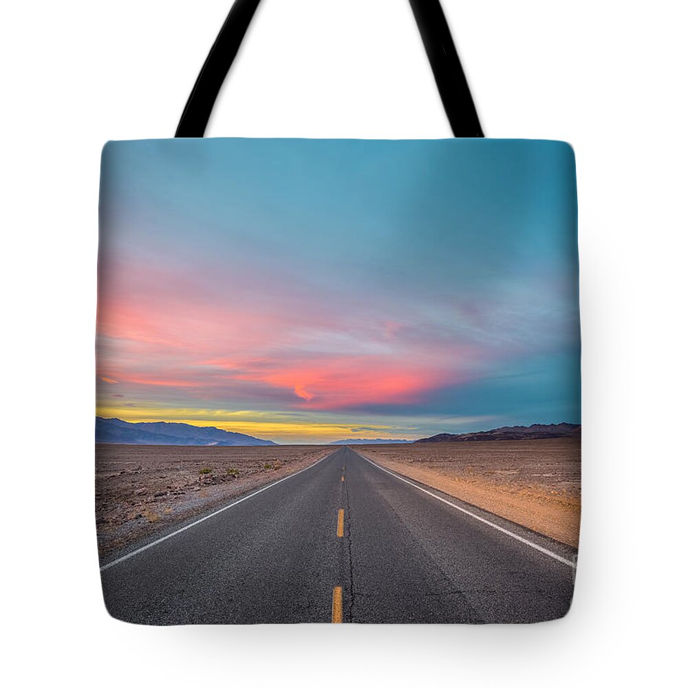 Badwater Tote Bag featuring the photograph Fiery Road though the Valley of Death by Mark Rogers