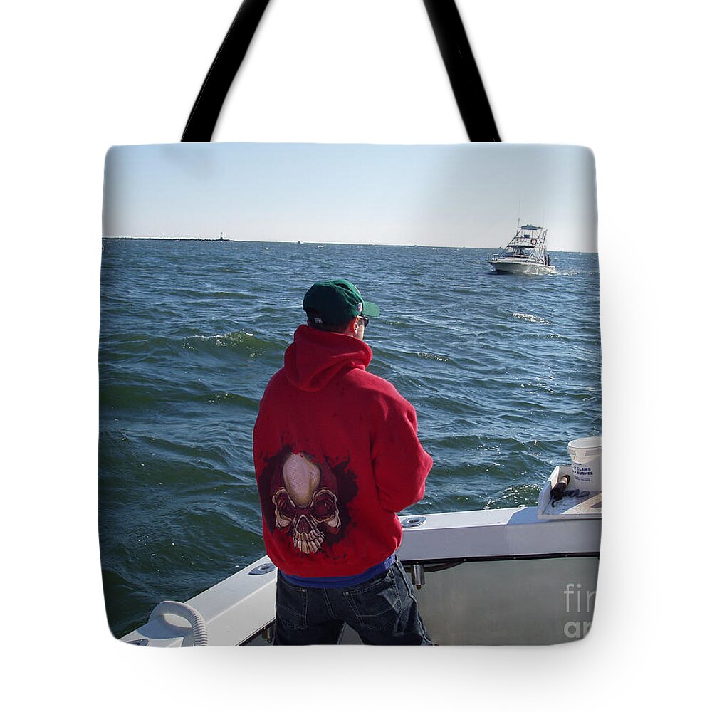 Fishing In Rough Seas Tote Bag featuring the photograph Fishing In Rough Seas by John Telfer