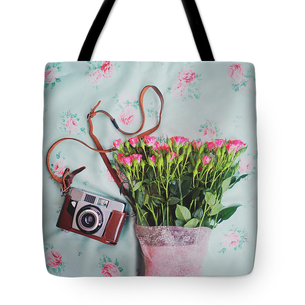 Fragility Tote Bag featuring the photograph Flowers And A Camera by Julia Davila-lampe