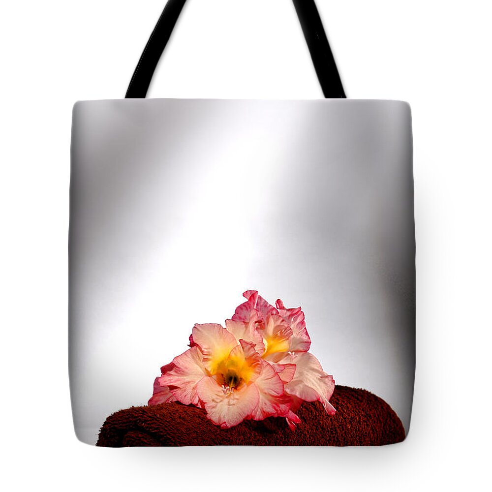 Gladiolus Tote Bag featuring the photograph Flowers on Towel by Olivier Le Queinec