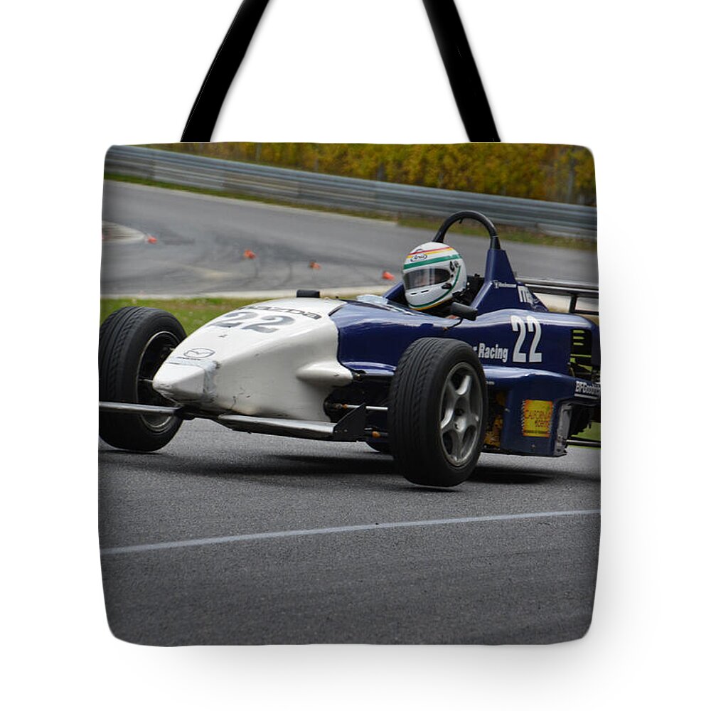 Formula Tote Bag featuring the photograph Flying Formula by Mike Martin