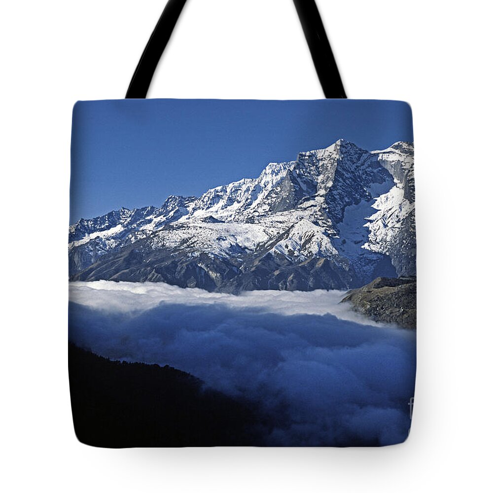 Craig Lovell Tote Bag featuring the photograph Fog in Everest Region by Craig Lovell