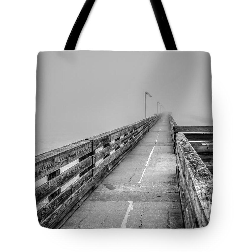 Atlantic Tote Bag featuring the photograph Foggy Fort Clinch Pier by Traveler's Pics