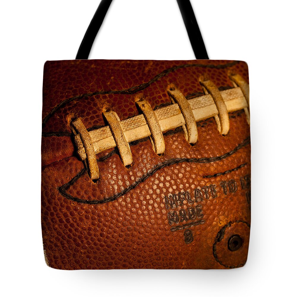 David Patterson Tote Bag featuring the photograph Football Laces by David Patterson