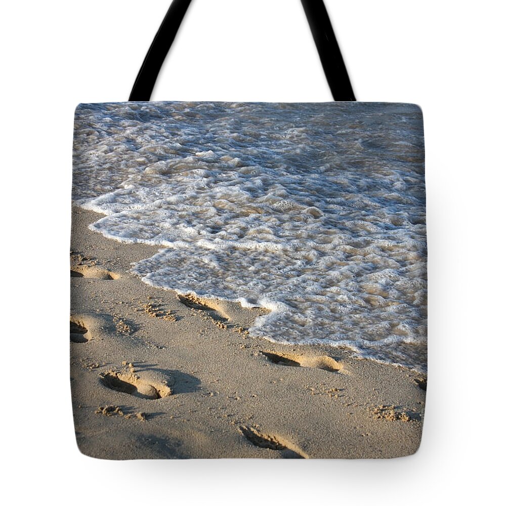 Beach Tote Bag featuring the photograph Footprints in the Sand by Jayne Carney