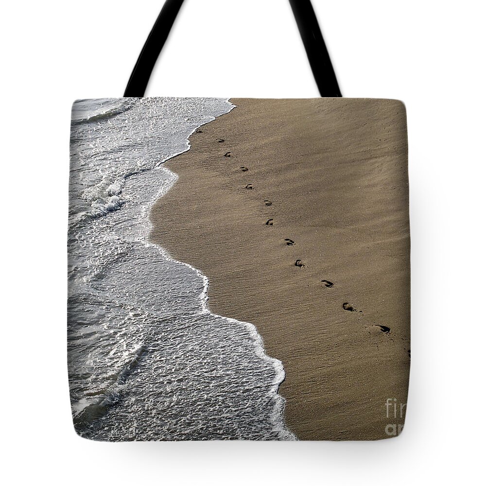 Sand Tote Bag featuring the photograph Footprints by Kelly Holm