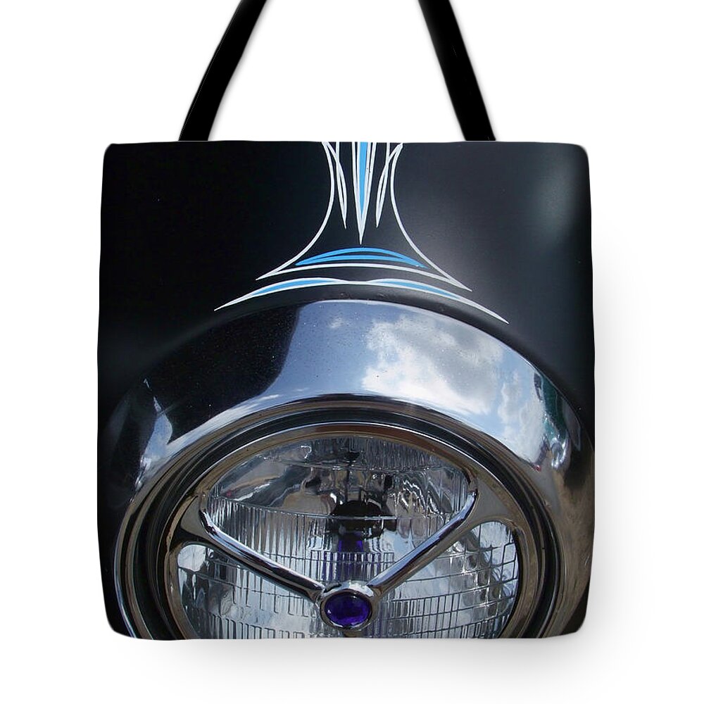 Headlight Tote Bag featuring the photograph Ford Pin striped headlight by Ron Roberts
