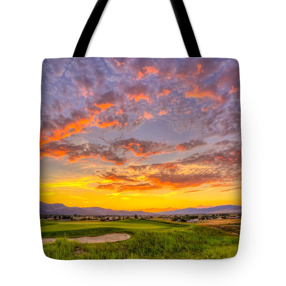 Clouds Tote Bag featuring the photograph Fourth Green Sunset in Missoula Montana by Fred J Lord
