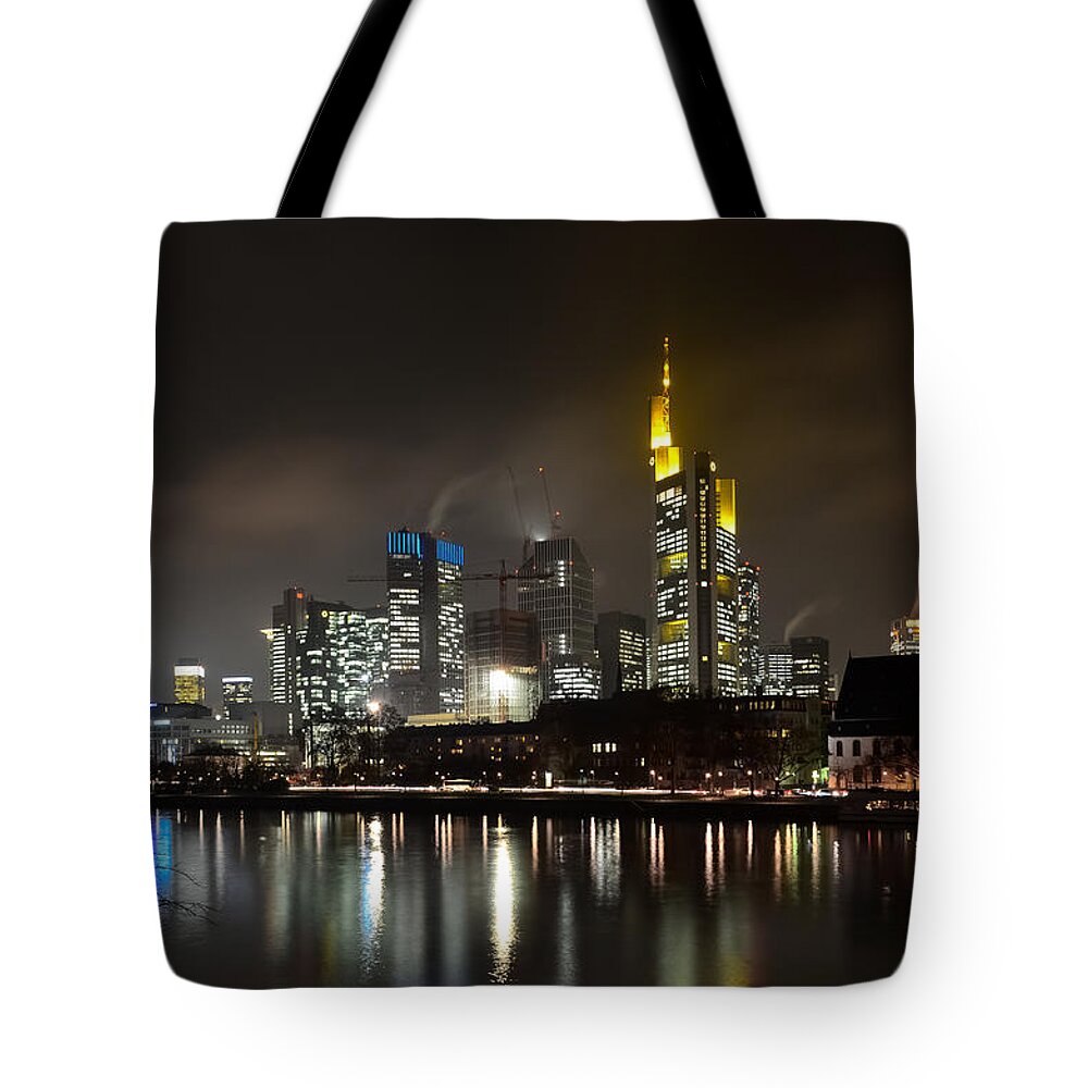 Europa Tower Tote Bag featuring the photograph Frankfurt Skyline At Night Reflected On by Sir Francis Canker Photography