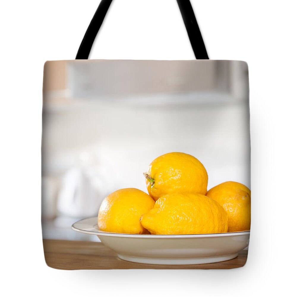 Lemon Tote Bag featuring the photograph Freshly Picked Lemons by Amanda Elwell