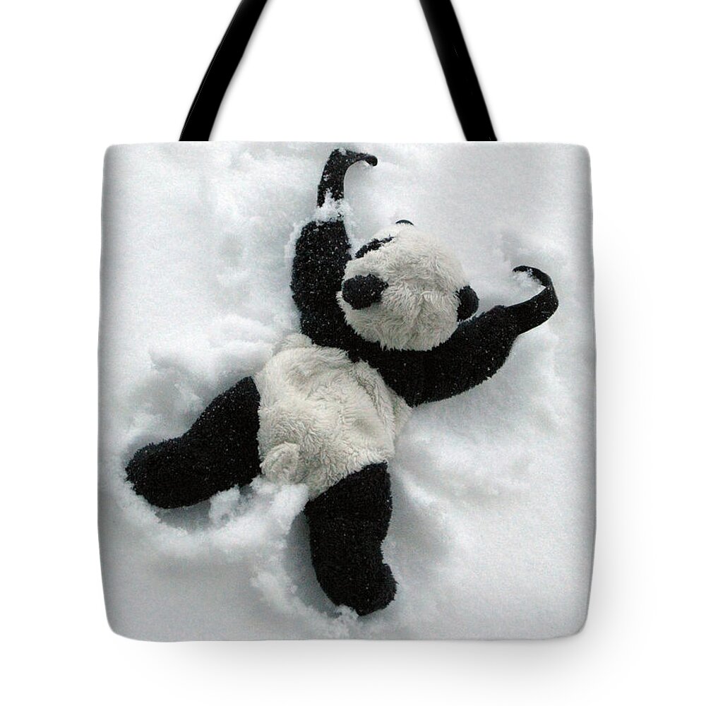 Baby Panda Tote Bag featuring the photograph Ginny The Baby Panda Making A Snow Angel by Ausra Huntington nee Paulauskaite