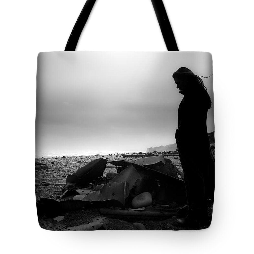 Black And White Tote Bag featuring the photograph Girl on the Beach by Gunnar Orn Arnason