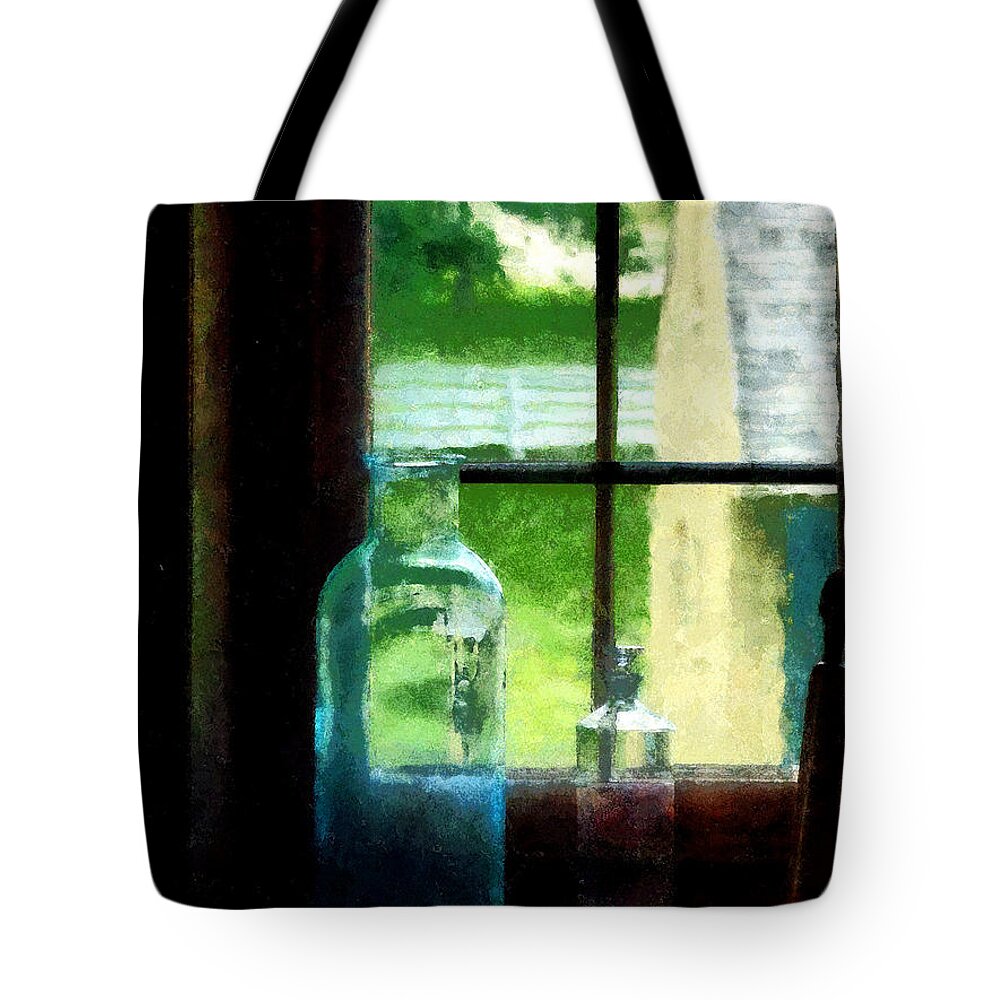 Bottles Tote Bag featuring the photograph Glass Bottles on Windowsill by Susan Savad