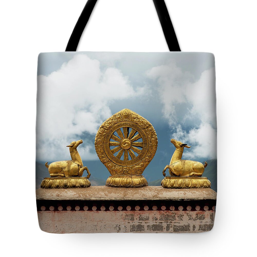 Chinese Culture Tote Bag featuring the photograph Gold Religious Symbols On Top Of A Wall by Keith Levit / Design Pics