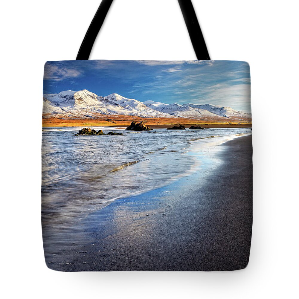 Water's Edge Tote Bag featuring the photograph Golden Hour On Beach At Vopnafjordur by Anna Gorin