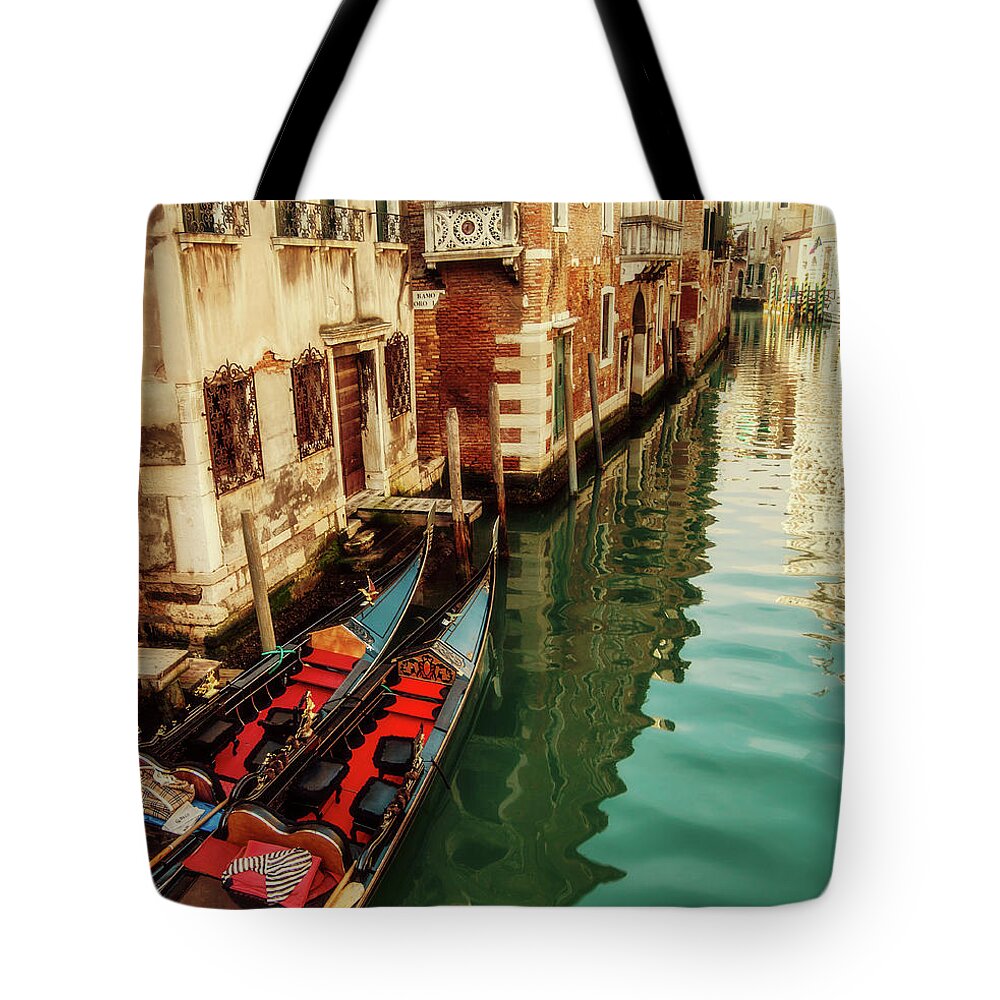 Tranquility Tote Bag featuring the photograph Gondolas Moored, Sunlit Buildings And by Lesleygooding