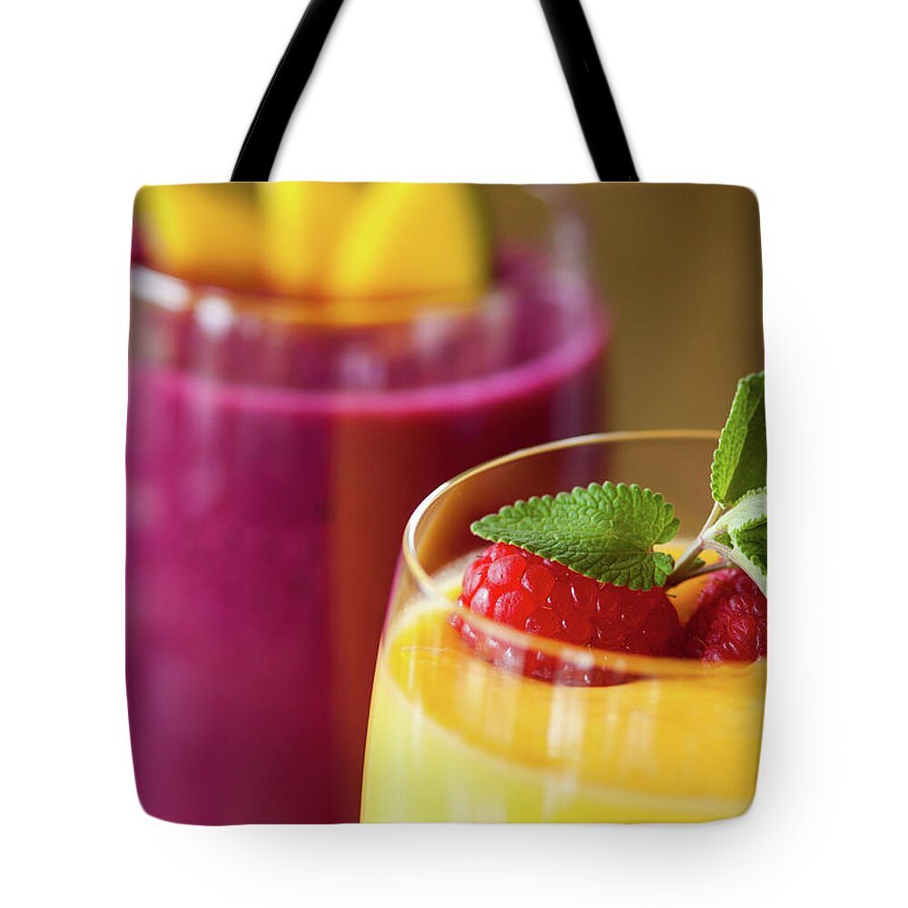 Milk Tote Bag featuring the photograph Gourmet Refreshing Fruit Smoothie by Adventure photo