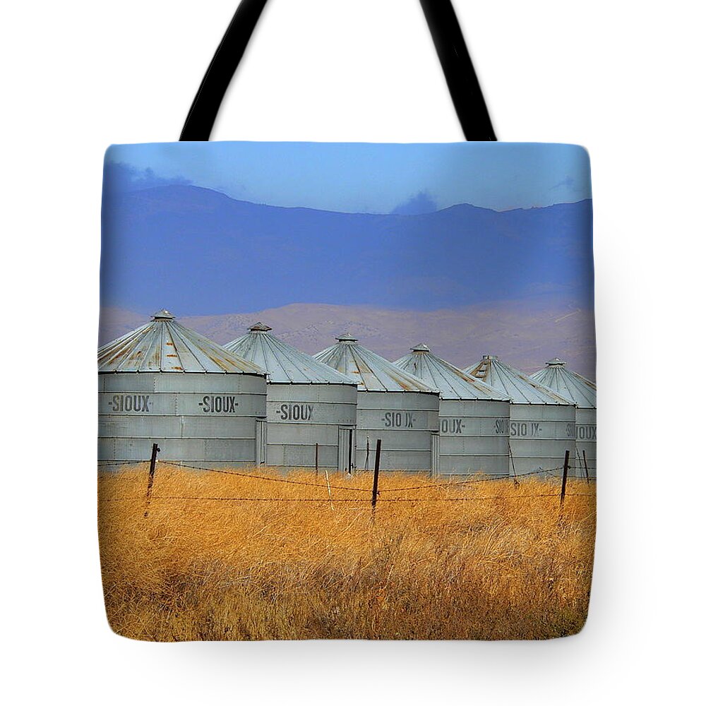 Grain Tote Bag featuring the photograph Grain Silos by Jeff Lowe