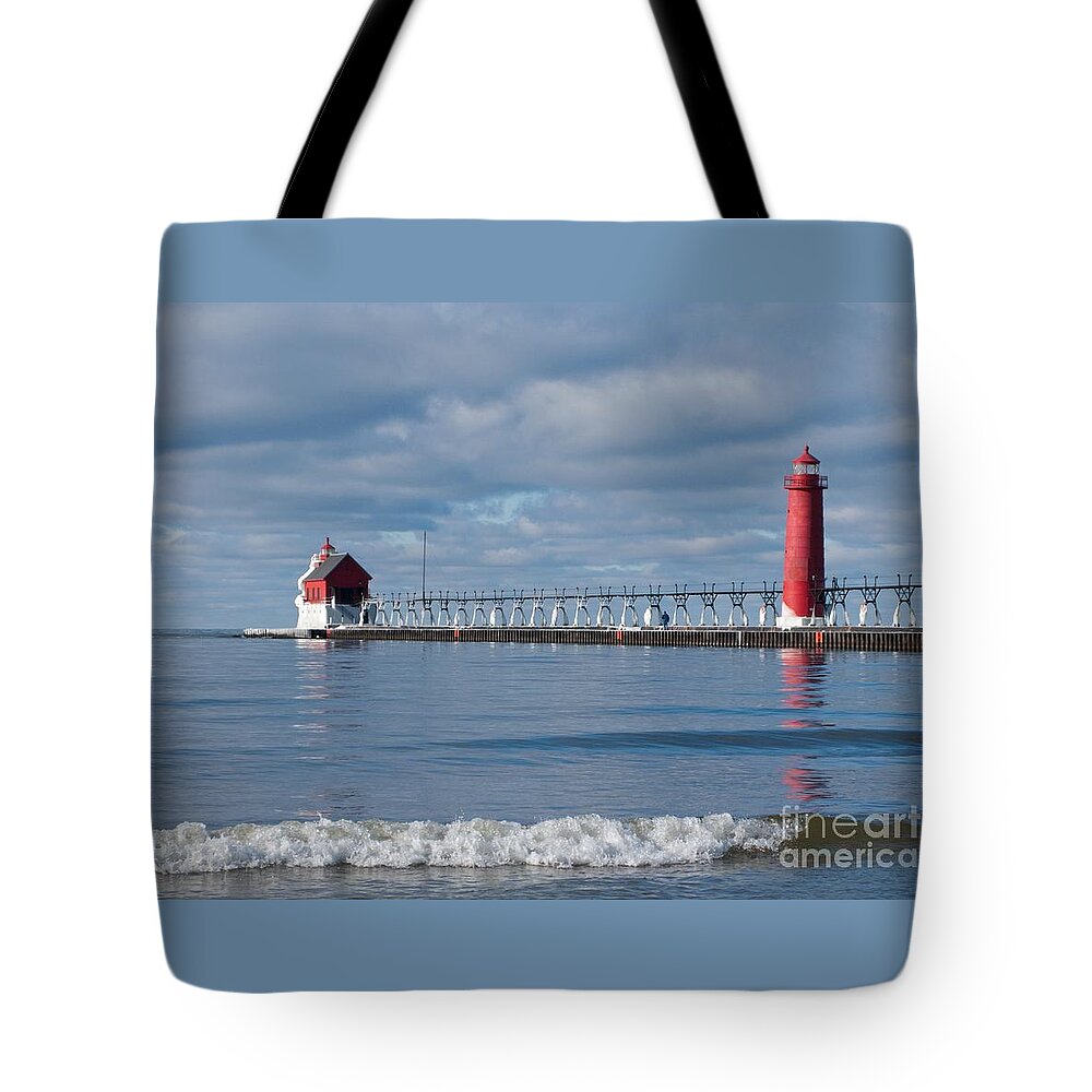 Lighthouse Tote Bag featuring the photograph Grand Haven Winter by Ann Horn