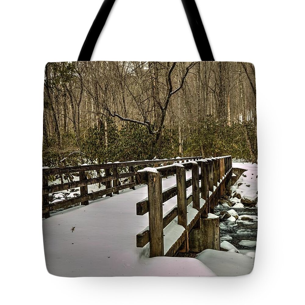 The Great Smoky Mountains National Park Tote Bag featuring the photograph Great Smoky Mountains National Park Foot Bridge In Snow by Carol Montoya
