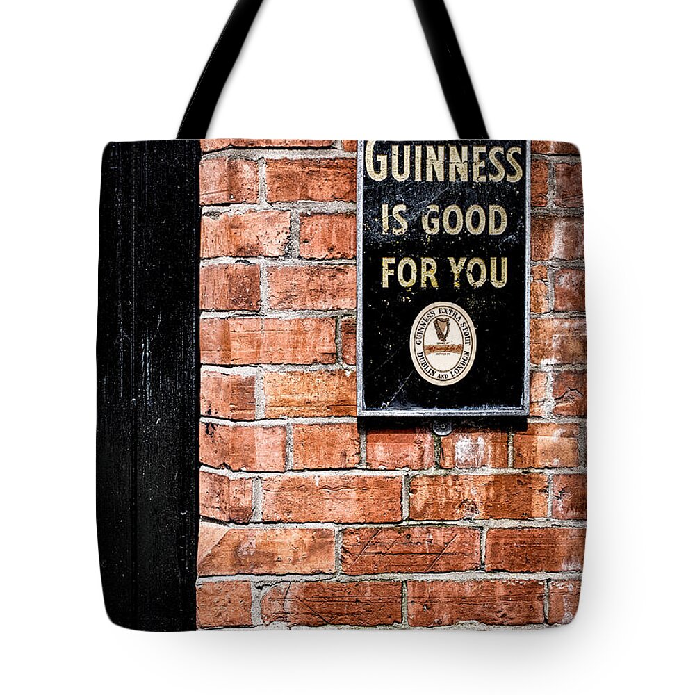 Guinness Tote Bag featuring the photograph Guinness is good for you by Nigel R Bell