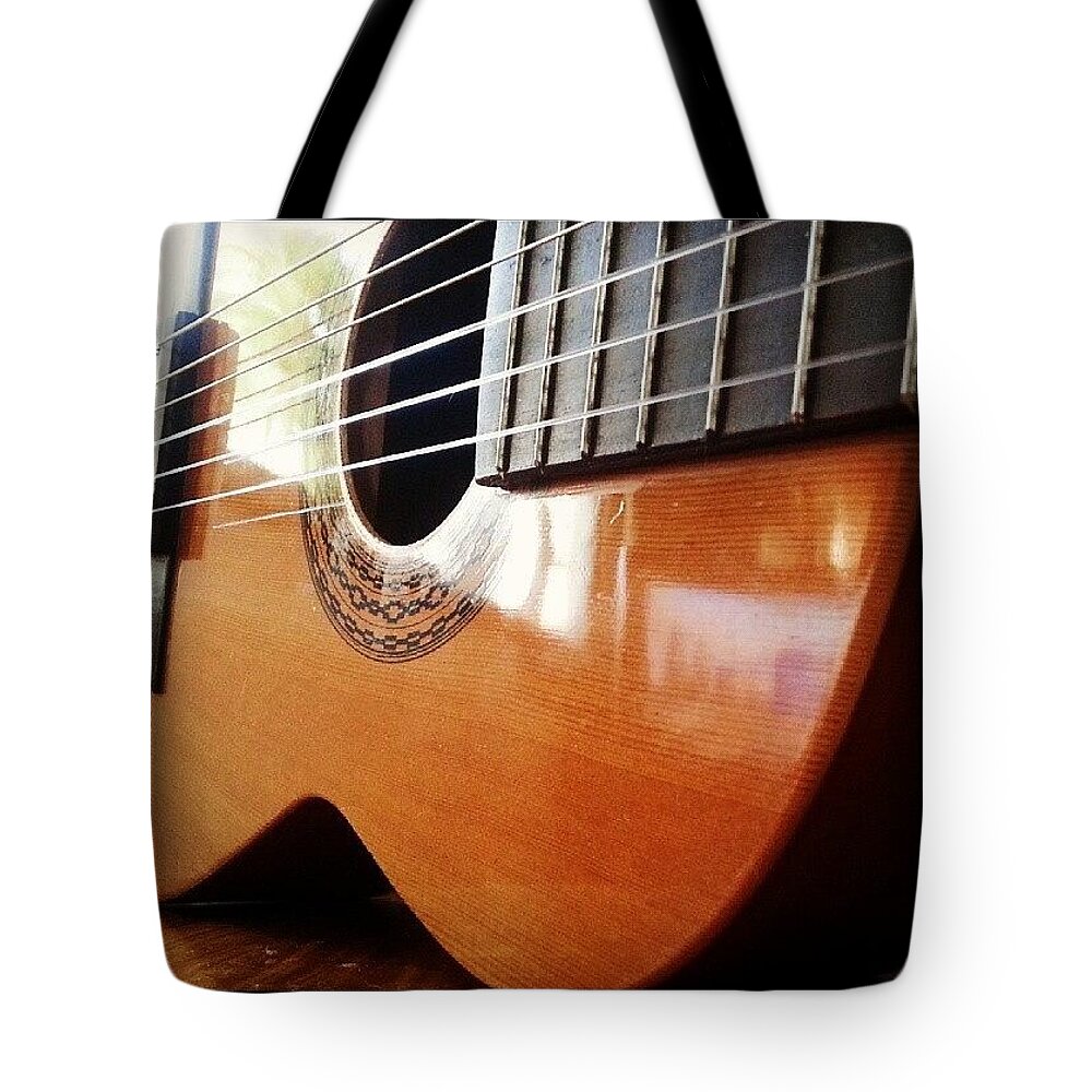 Guitar Tote Bag featuring the photograph #guitar #music #musicalinstrument by Abbie Shores