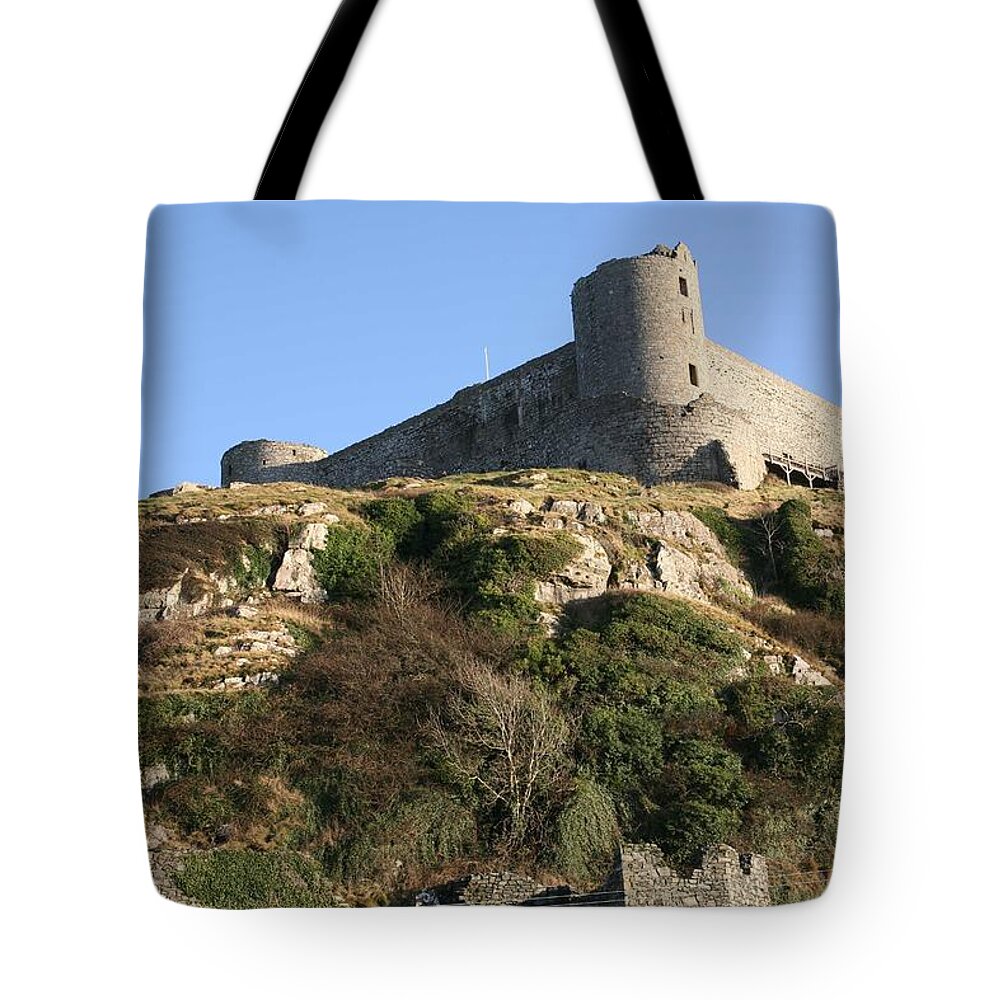 Castles Tote Bag featuring the photograph Harlech castle by Christopher Rowlands