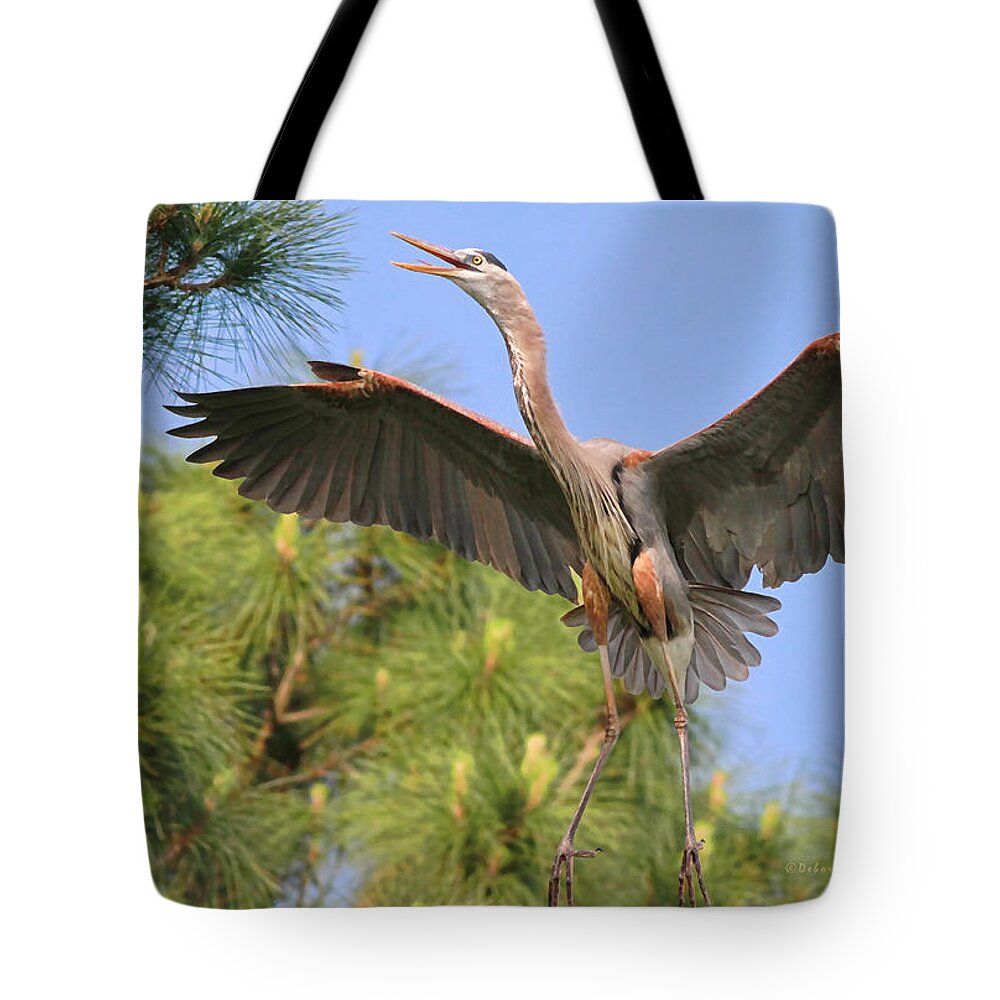 Blue Heron Tote Bag featuring the photograph HB in the Pines by Deborah Benoit