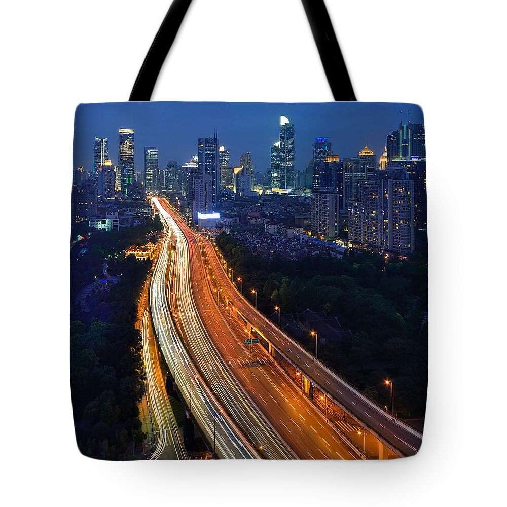 Treetop Tote Bag featuring the photograph High-angle View Of A Multi-stack by Wei Fang