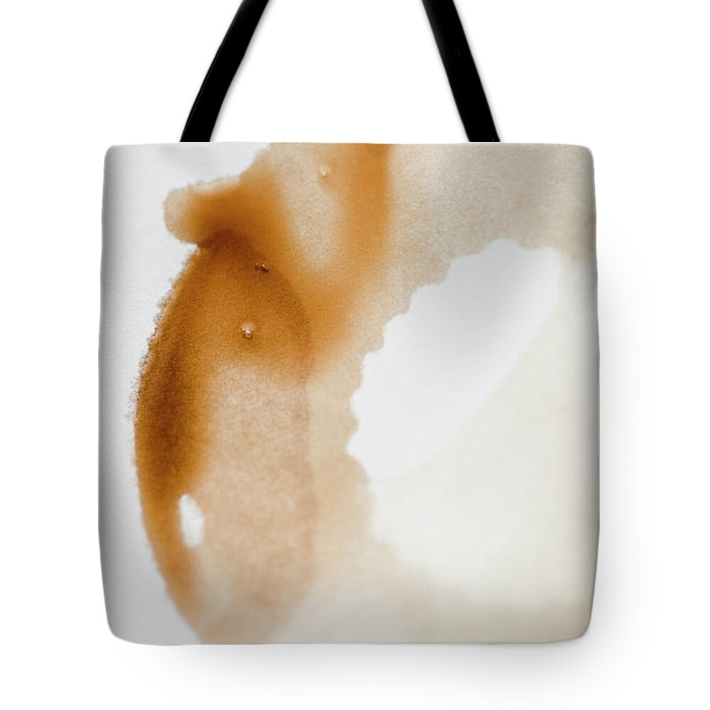 Sweden Tote Bag featuring the photograph High Angle View Of Coffee Stains On by Johner Images