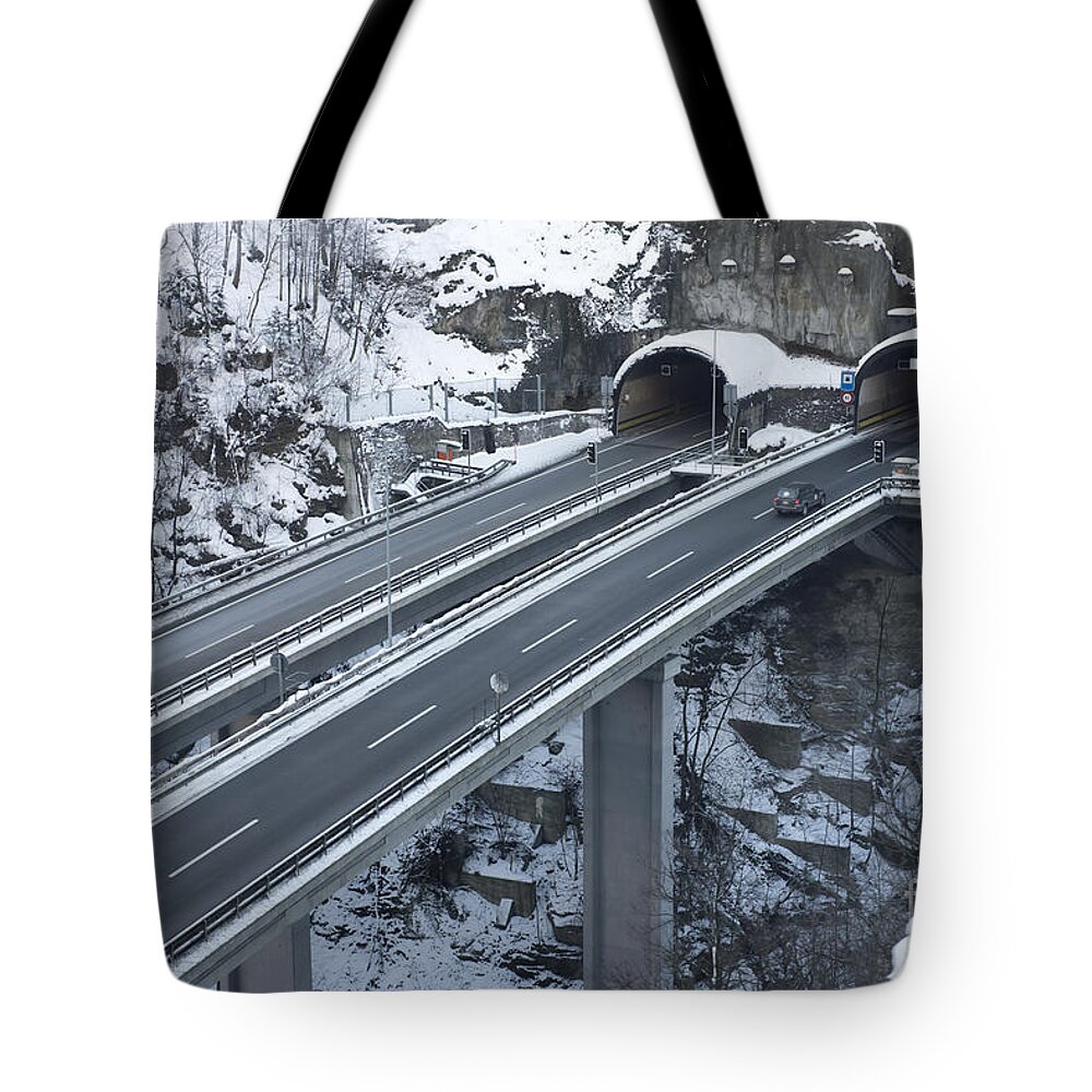 Highway Tote Bag featuring the photograph Higway tunnel with a bridge by Mats Silvan