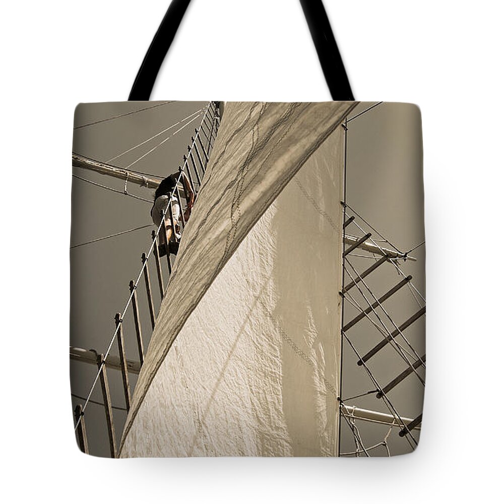 Schooner Tote Bag featuring the photograph Hoisting The Mainsail In Sepia by Jani Freimann