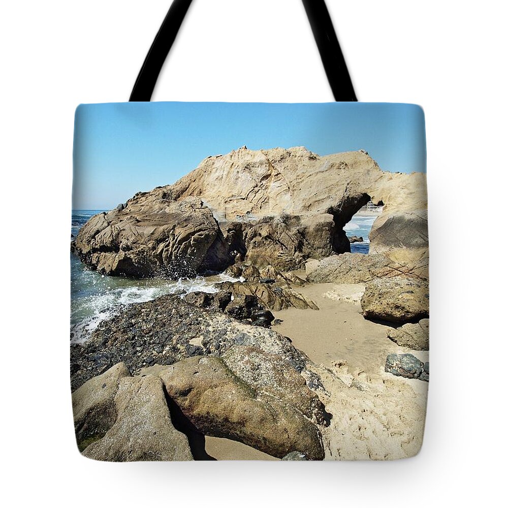 Beach Tote Bag featuring the photograph Hole in the Rock by Steve Ondrus