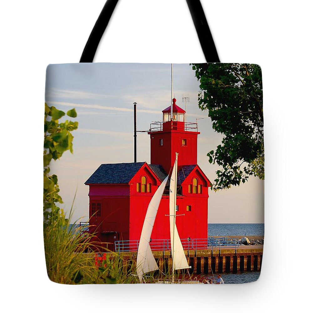 Attraction Tote Bag featuring the photograph Holland Lighthouse by Nick Zelinsky Jr